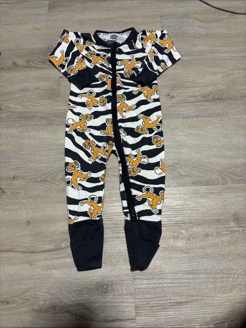 Bonds Disney Kids One-Piece Zipper Pajama - Black, White & Tan Lion King Print